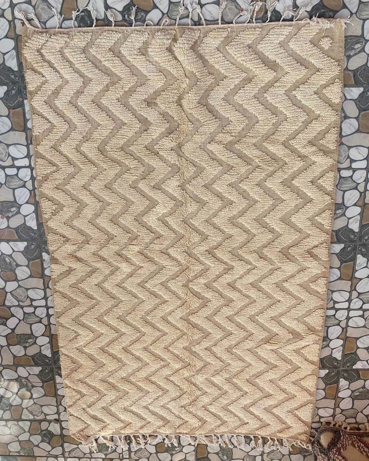 Cream Chevron Beni Ourain Rug, full view laid flat on the workshop floor