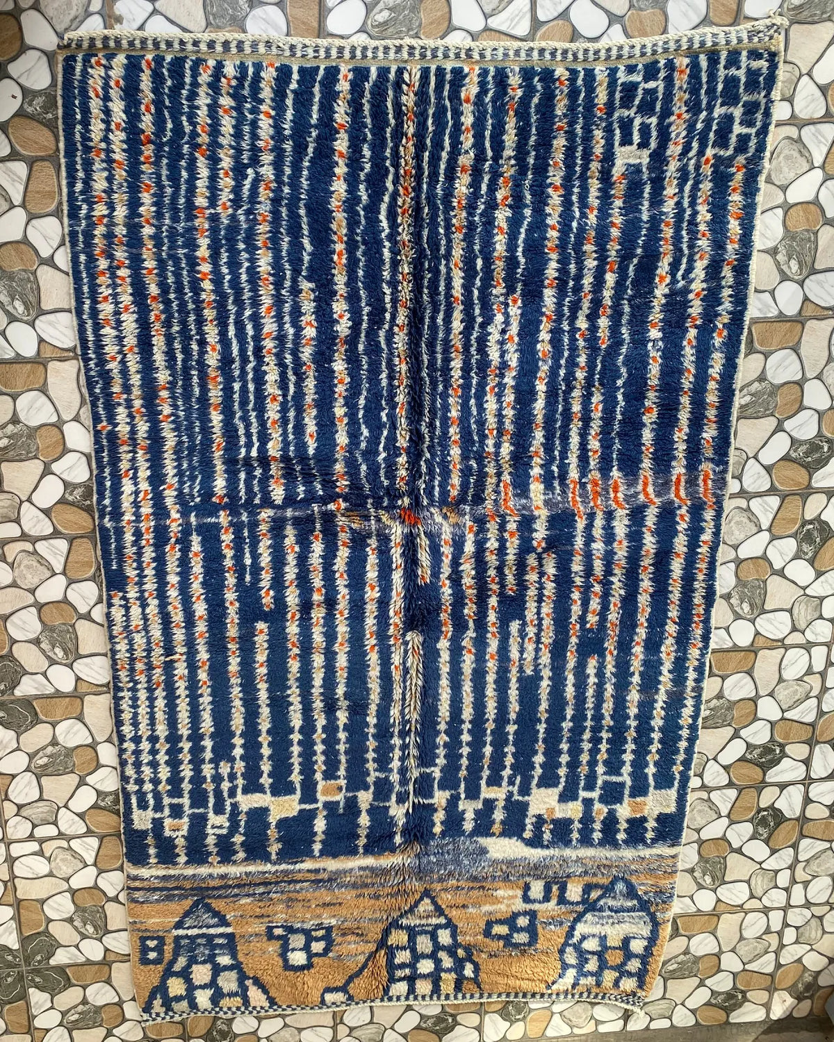 Navy Blue Stripe Moroccan Rug, full view laid flat on the workshop floor