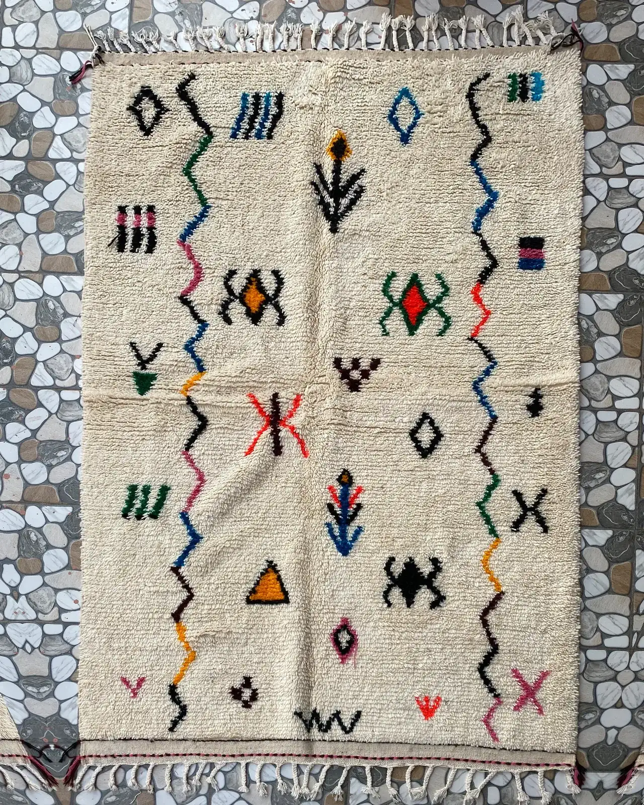 Berber Symbol Azilal Rug, full view laid flat on the workshop floor