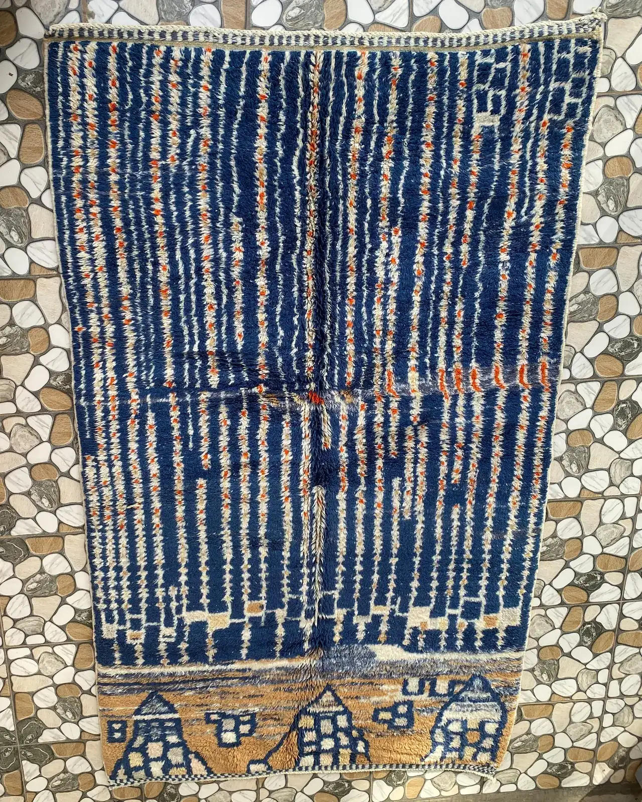 Navy Blue Stripe Moroccan Rug, full view laid flat on the workshop floor