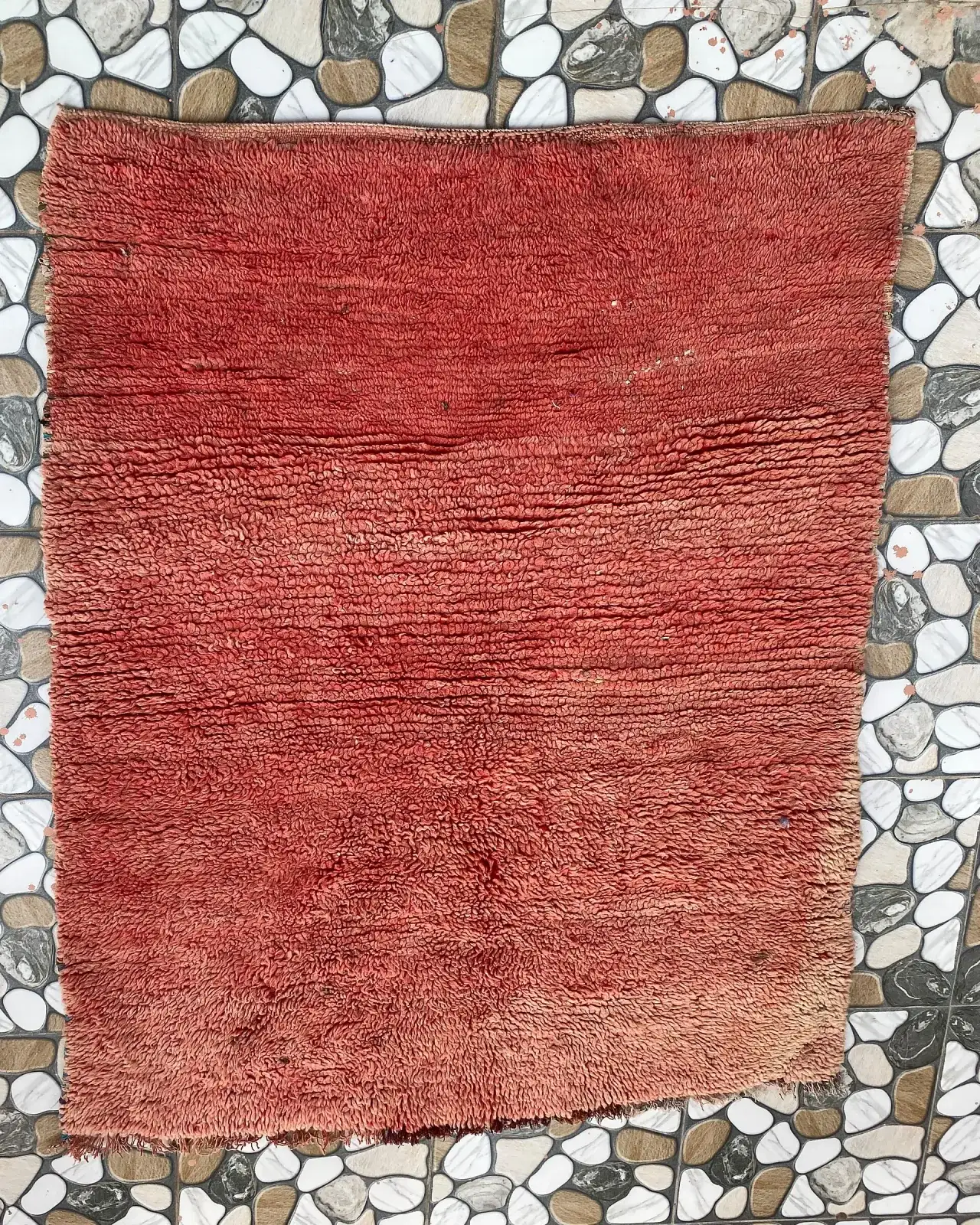 Rust Red Plain Moroccan Rug, full view laid flat on the workshop floor