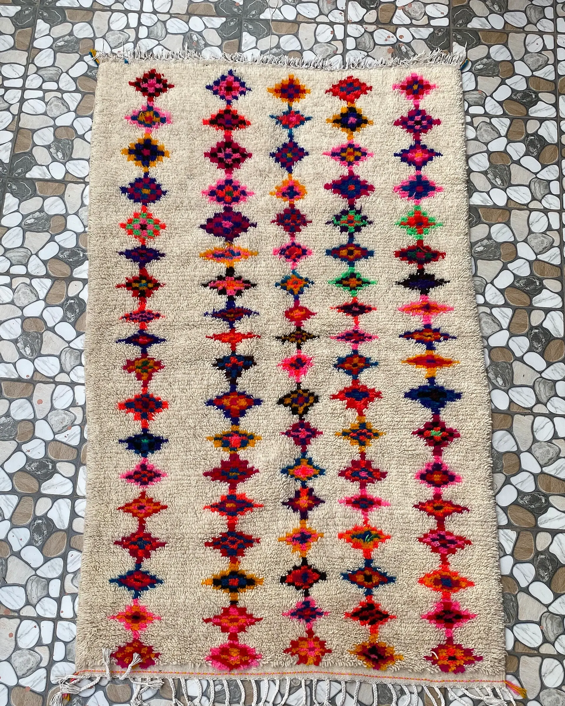 Multicolor Diamond Azilal Rug, full view laid flat on the workshop floor