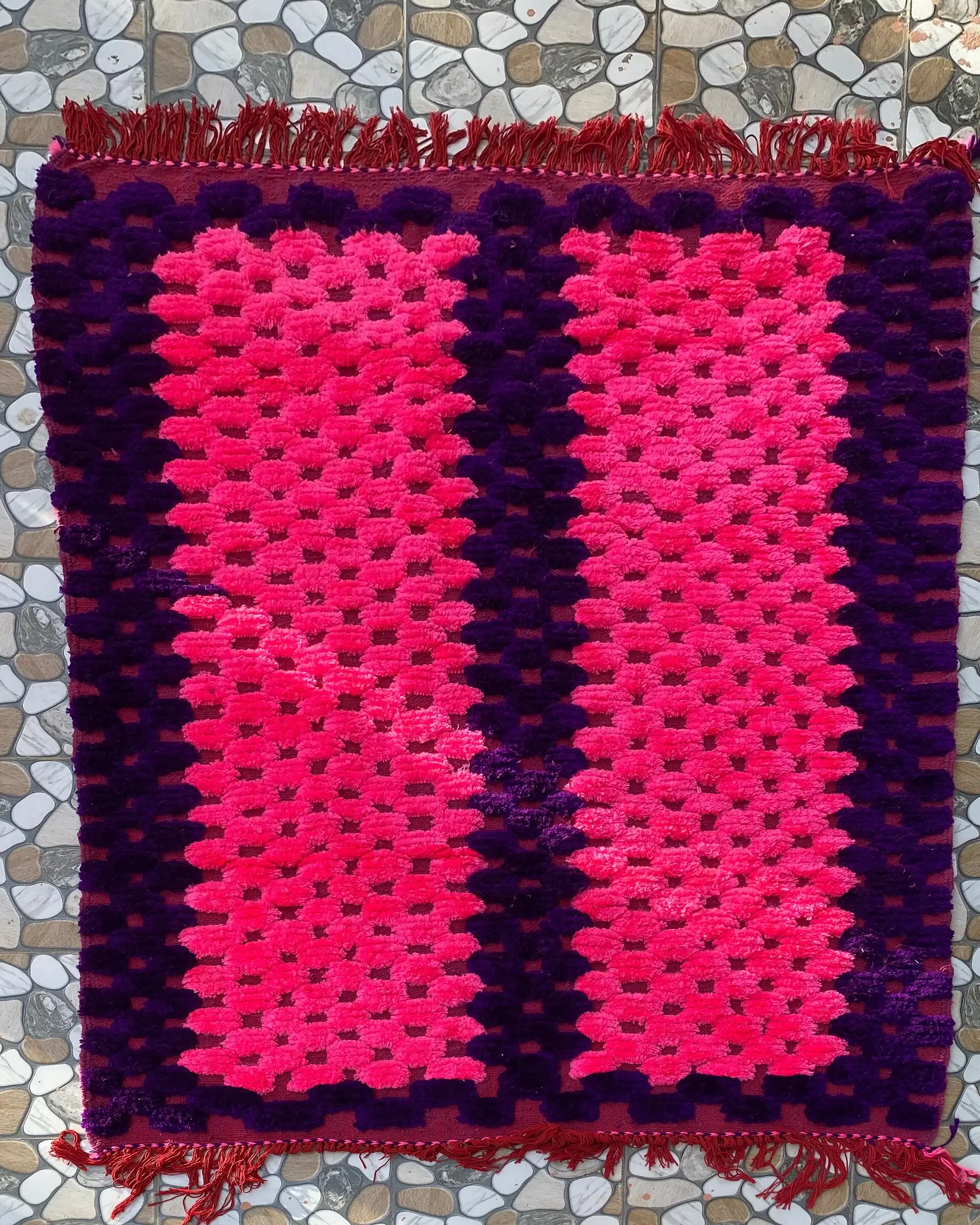 Hot Pink and Purple Boujad Rug, full view laid flat on the workshop floor