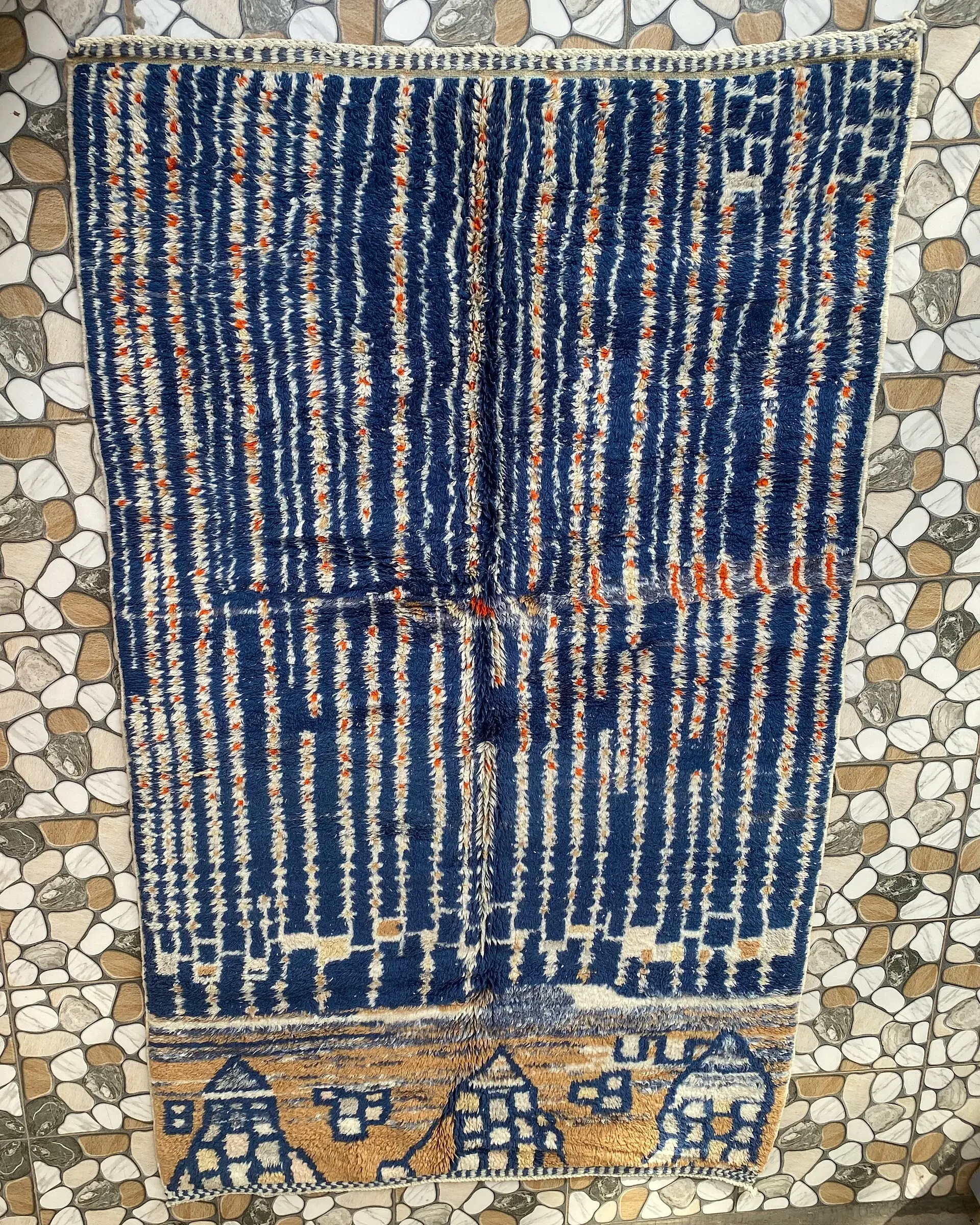 Navy Blue Stripe Moroccan Rug, full view laid flat on the workshop floor