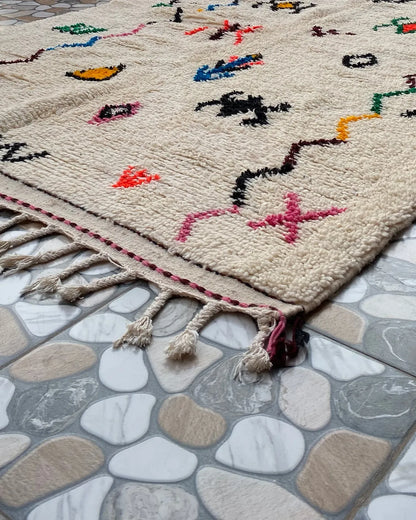 Berber Symbol Azilal Rug, seen at an angle on the workshop floor