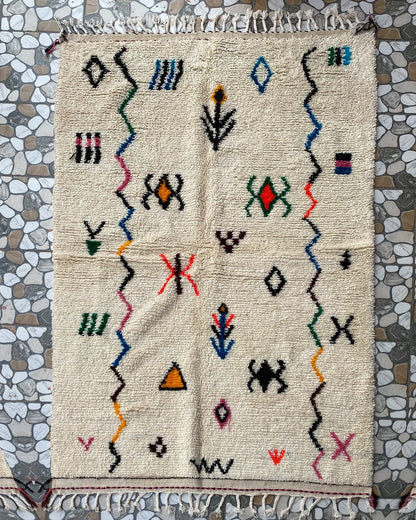 Berber Symbol Azilal Rug, full view laid flat on the workshop floor