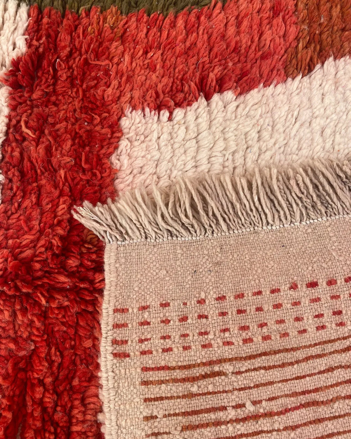 Red and Olive Color Block Moroccan Rug, the back of the rug showing the hand-tied knots