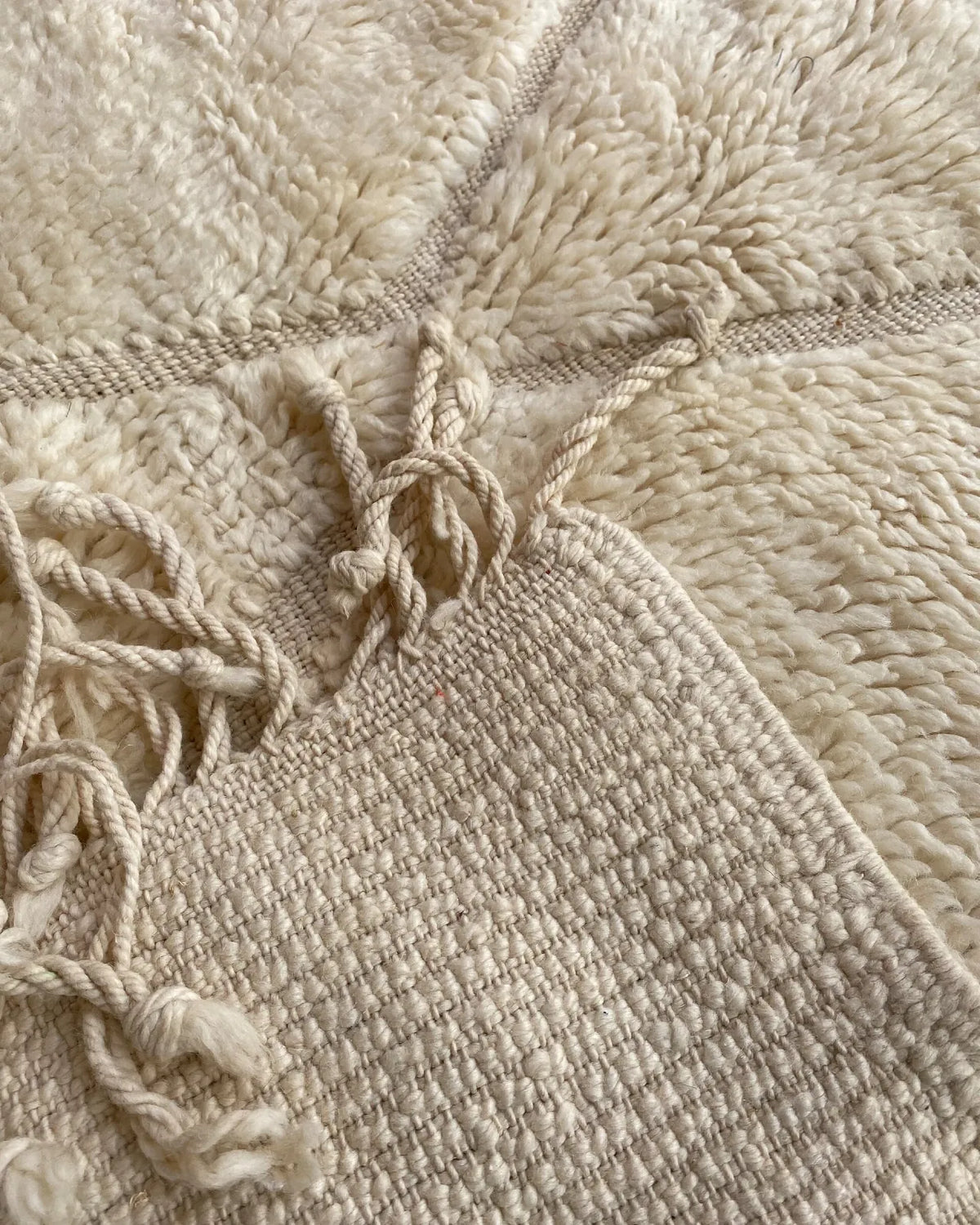 Cream Diamond Relief Beni Ourain Rug, the back of the rug showing the hand-tied knots