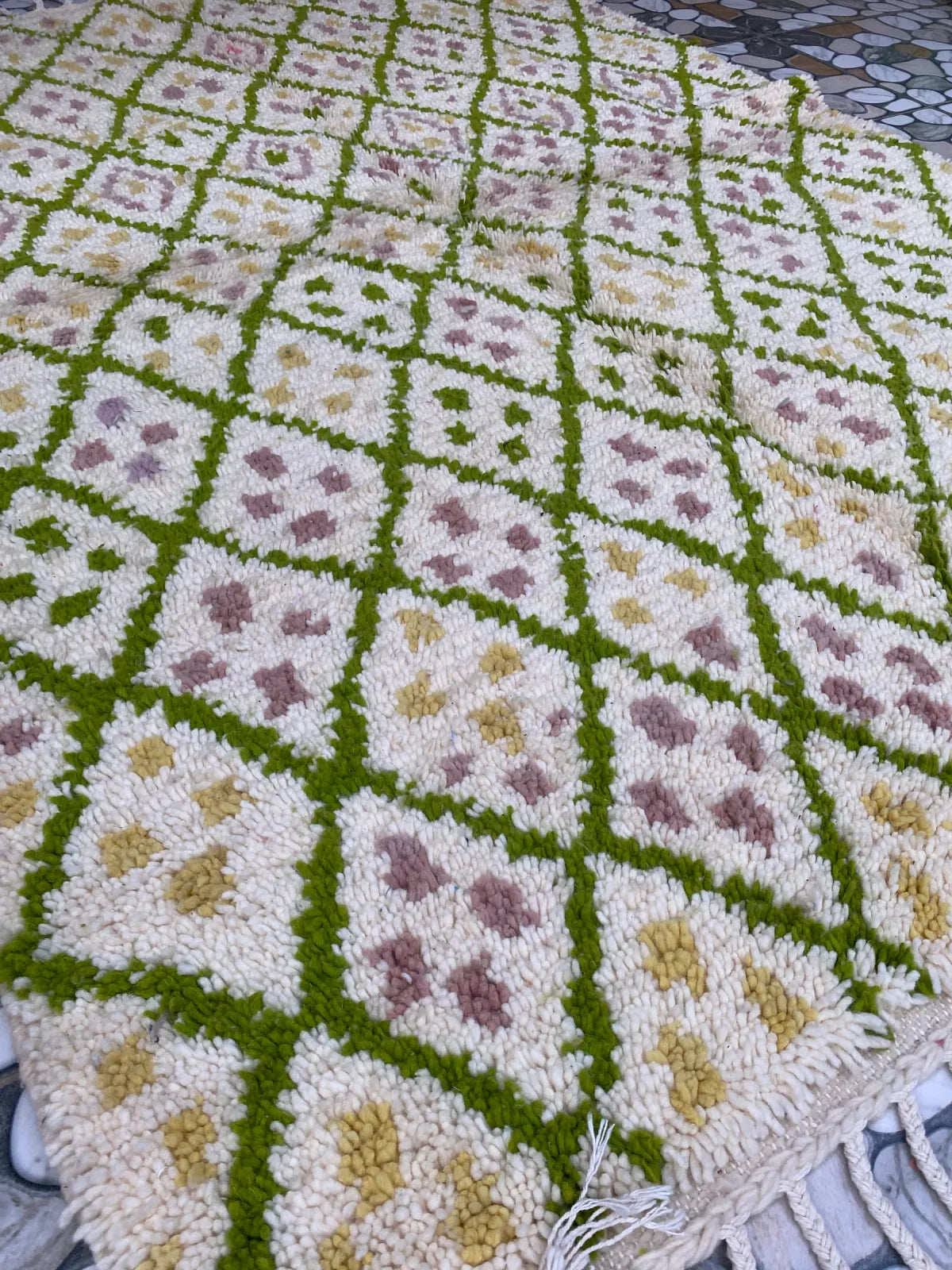 Green Lattice Beni Ourain Rug, laid flat on the workshop floor