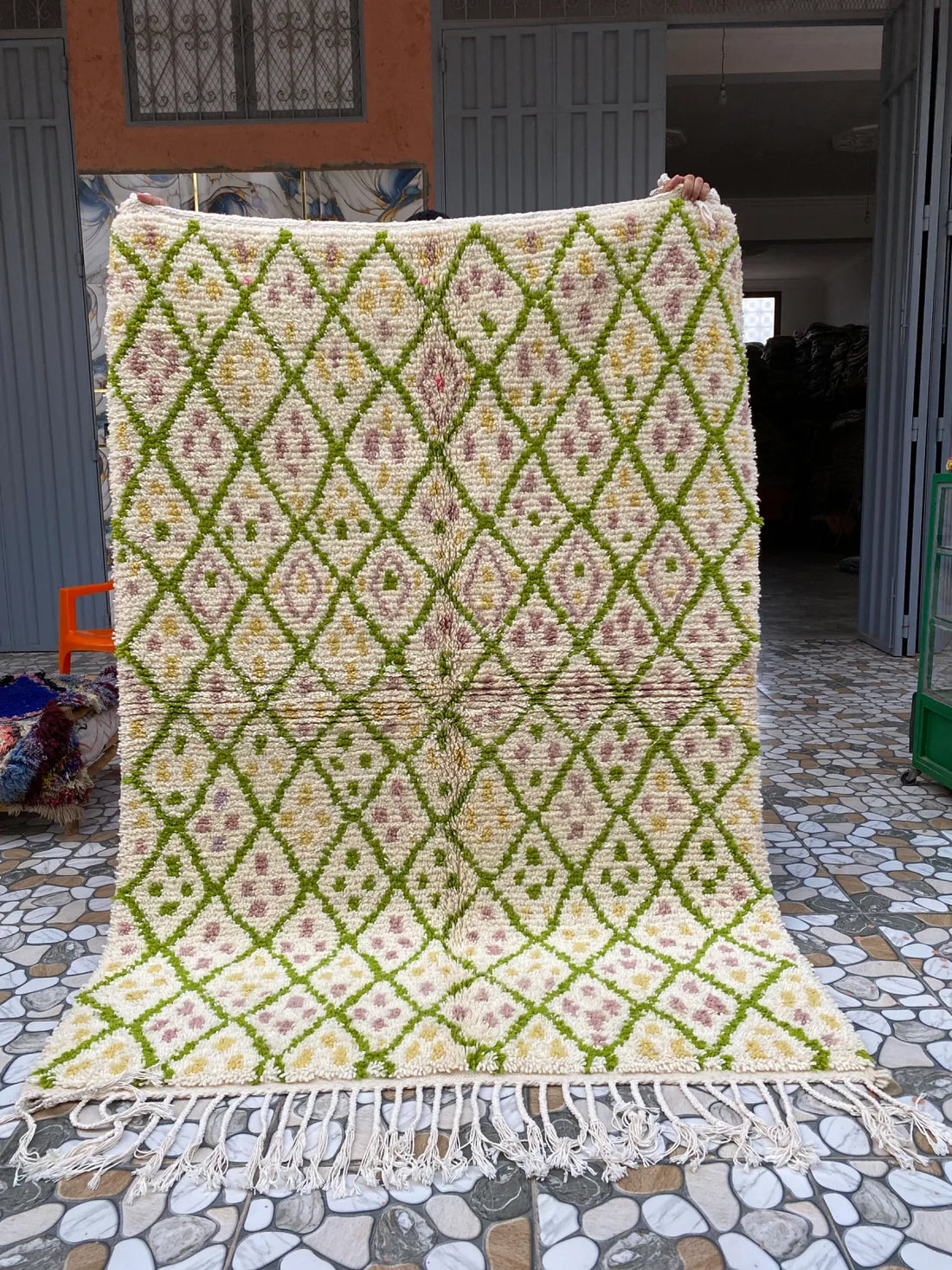 Green Lattice Beni Ourain Rug, held up to show the full design