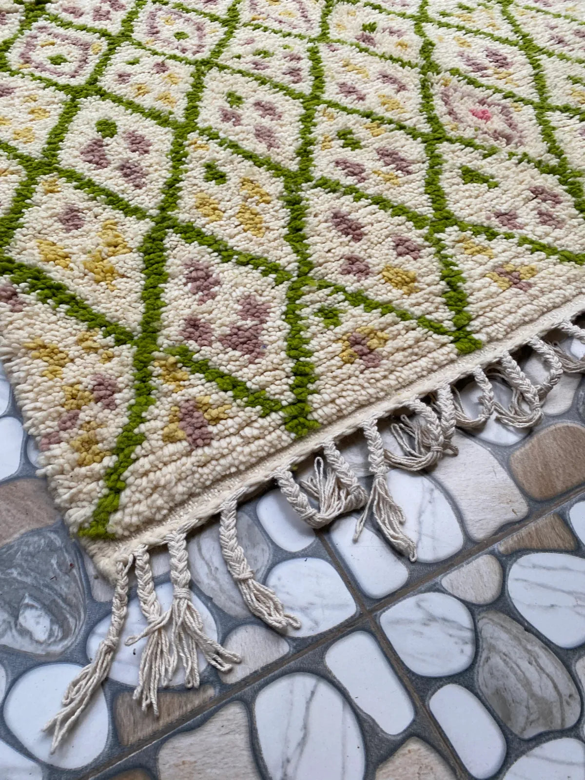Green Lattice Beni Ourain Rug, a corner with the braided fringe