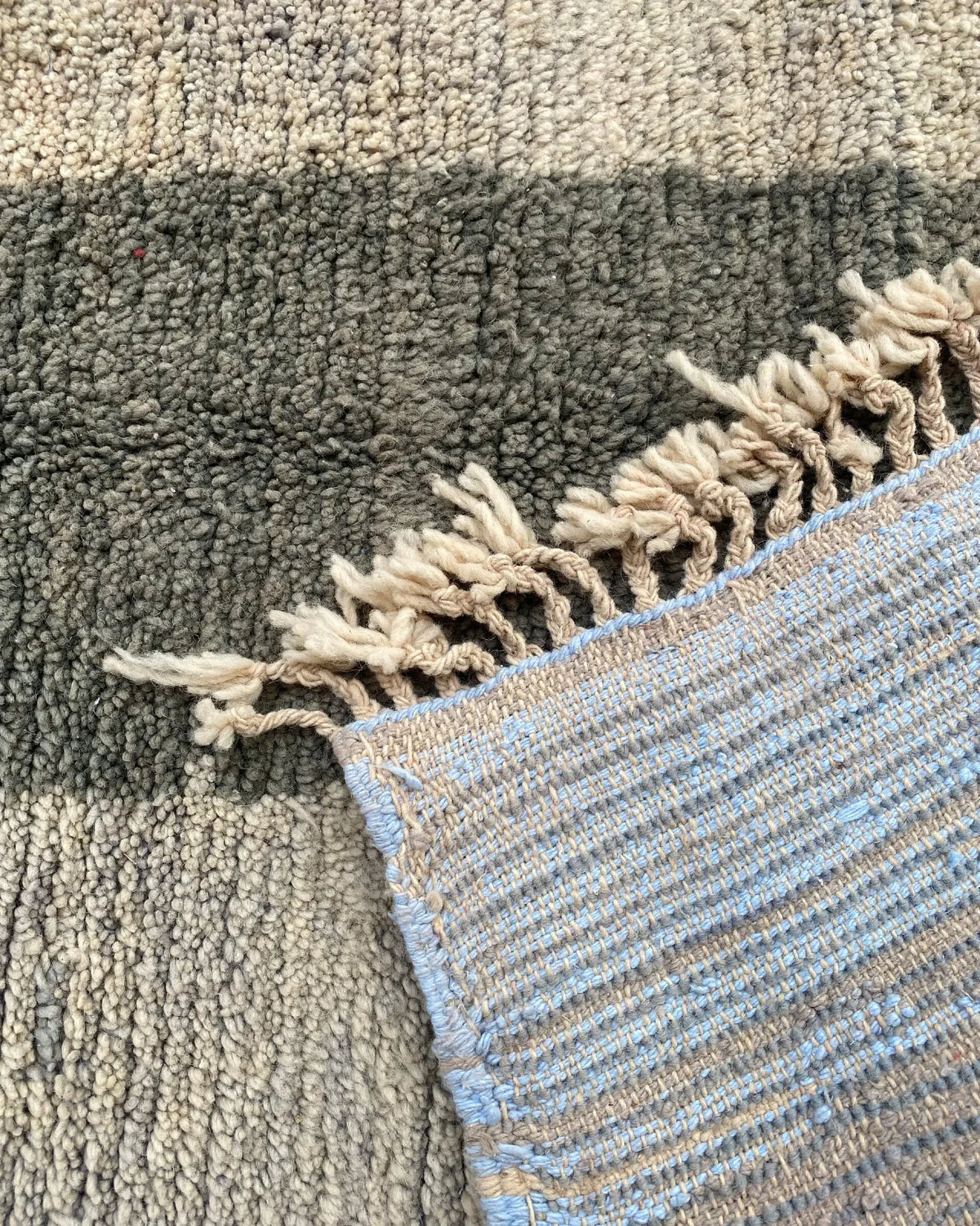 Gray and Charcoal Beni Ourain Rug, the back of the rug showing the hand-tied knots