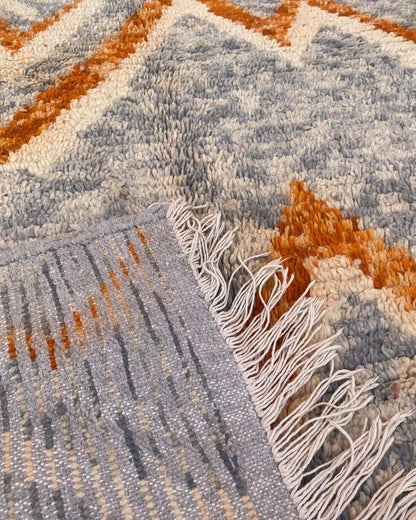 Gray and Orange Zigzag Moroccan Rug, the back of the rug showing the hand-tied knots