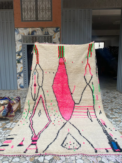 Hot Pink and Ivory Azilal Rug, held up to show the full design