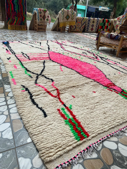 Hot Pink and Ivory Azilal Rug, laid out in the workshop courtyard