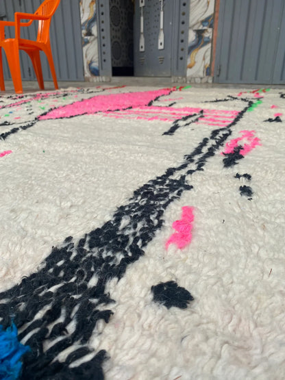 Hot Pink and Ivory Azilal Rug, close-up of the black, pink and blue motifs in the pile