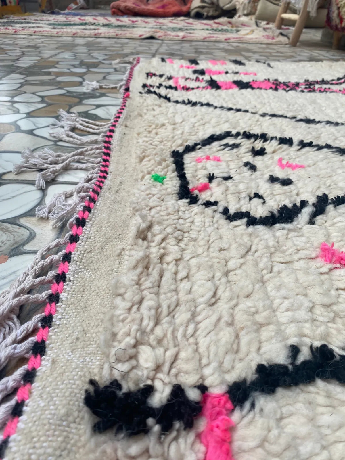 Hot Pink and Ivory Azilal Rug, detail of the pile, the pink and black edge and the fringe