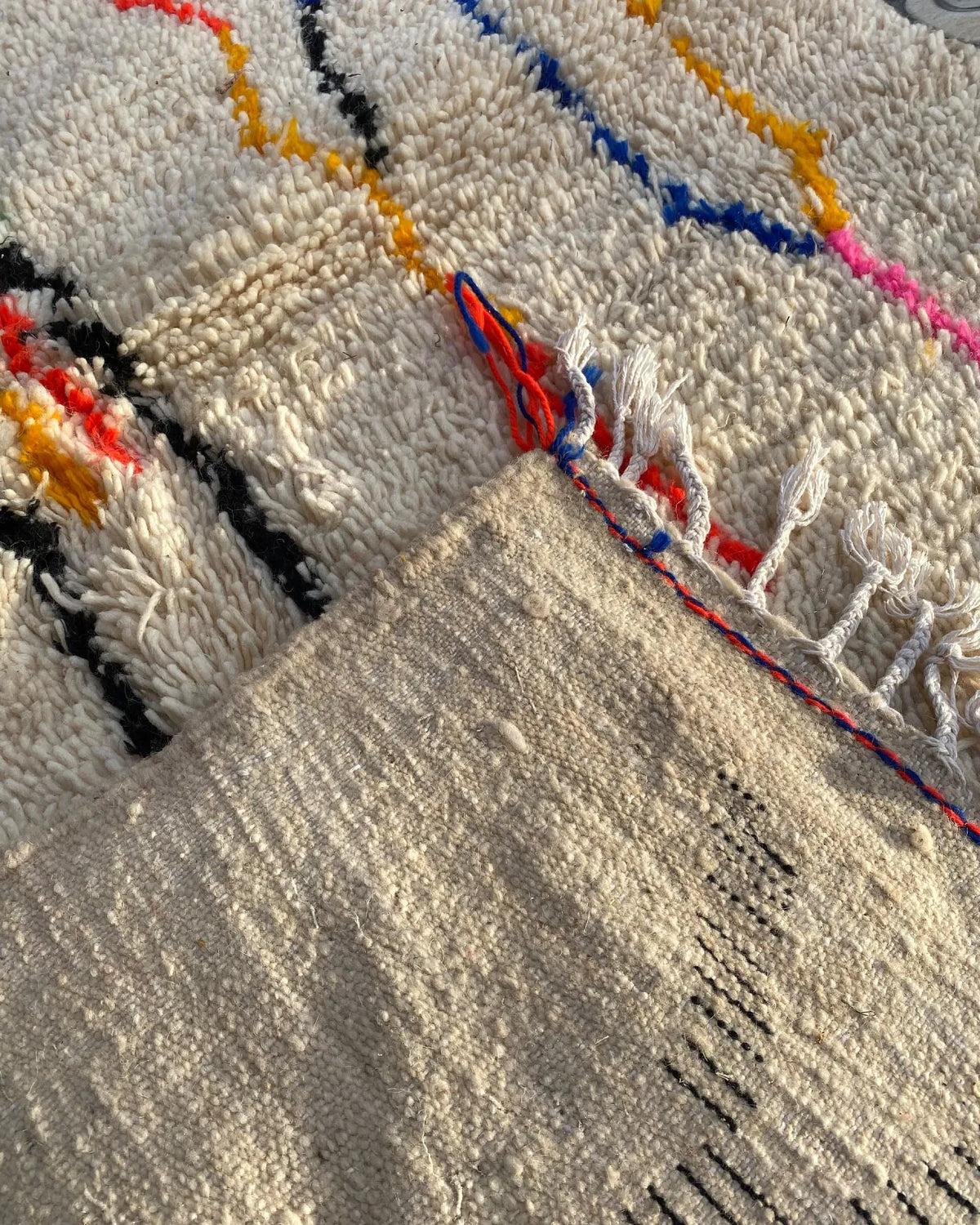 Ivory Line Art Azilal Rug, the back of the rug showing the hand-tied knots