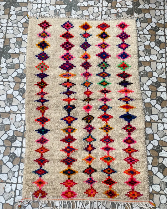 Multicolor Diamond Azilal Rug, full view laid flat on the workshop floor