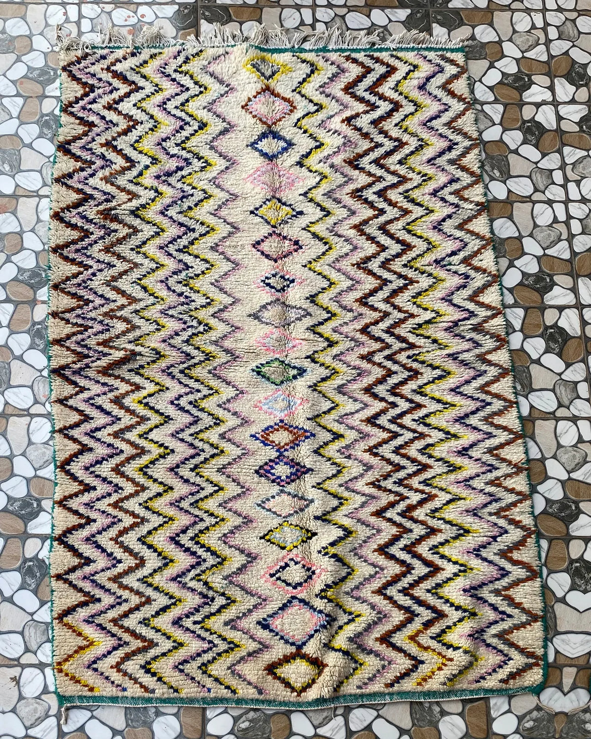Multicolor Zigzag Moroccan Rug, full view laid flat on the workshop floor