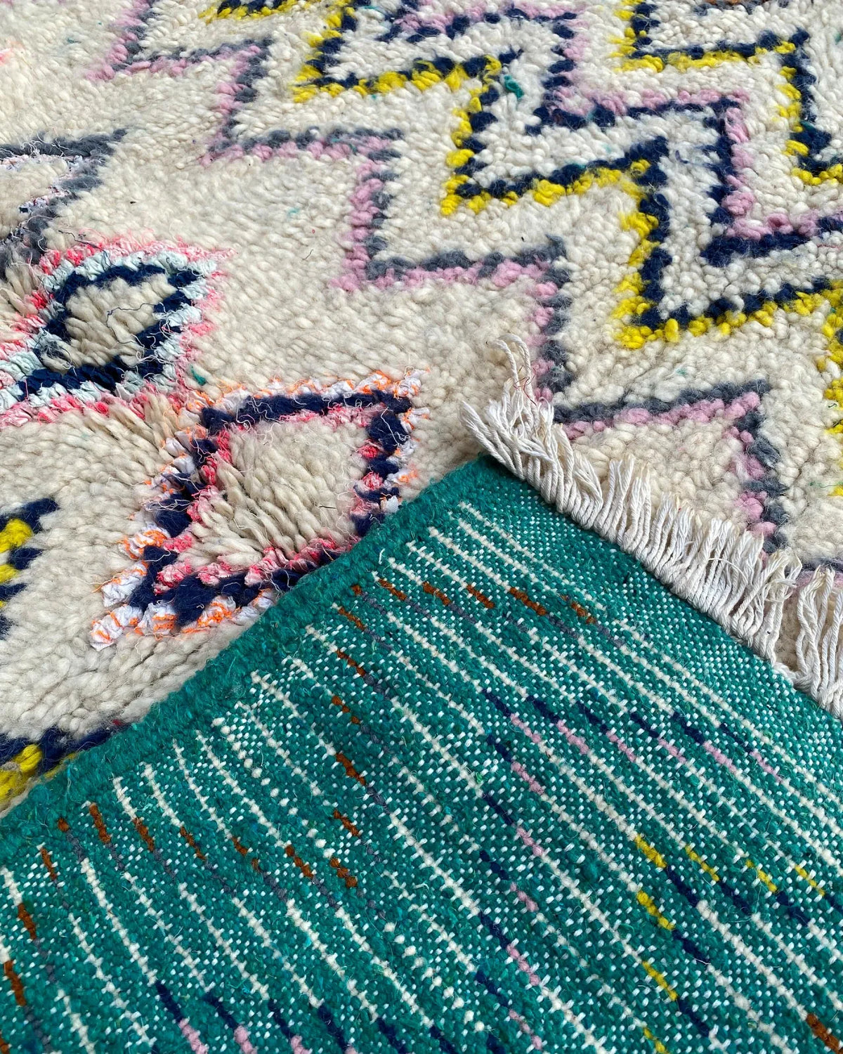 Multicolor Zigzag Moroccan Rug, the back of the rug showing the hand-tied knots