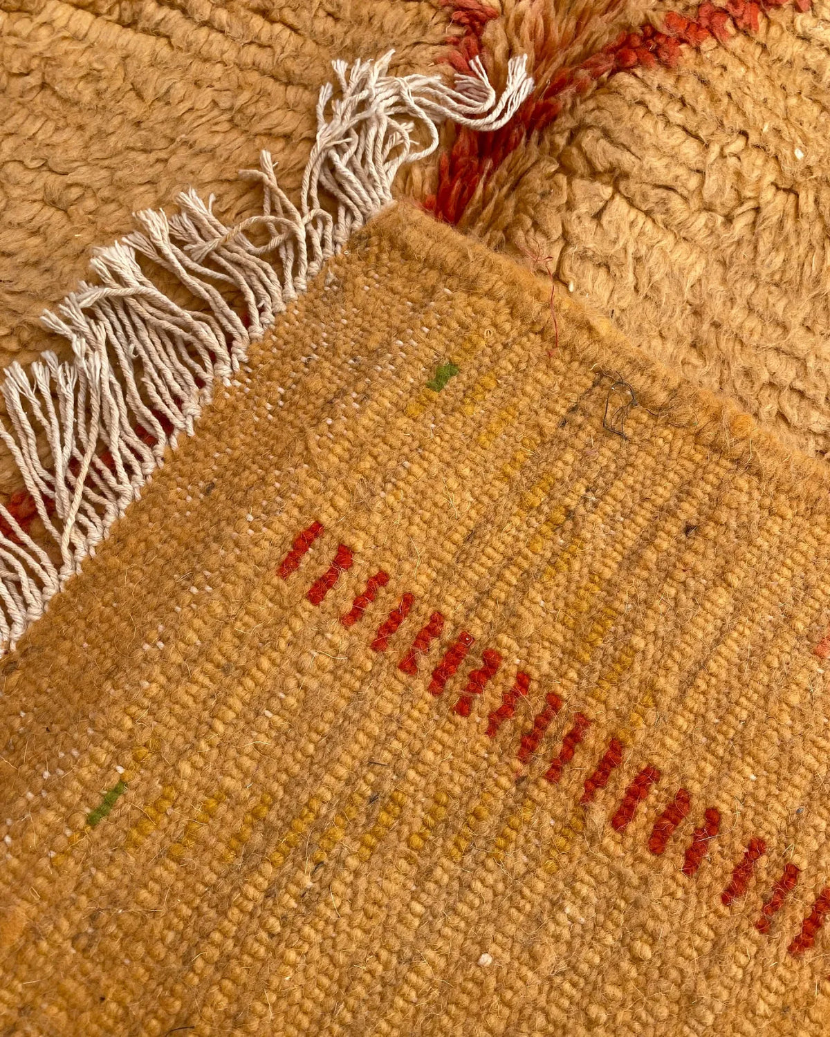 Mustard Yellow Diamond Moroccan Rug, the back of the rug showing the hand-tied knots