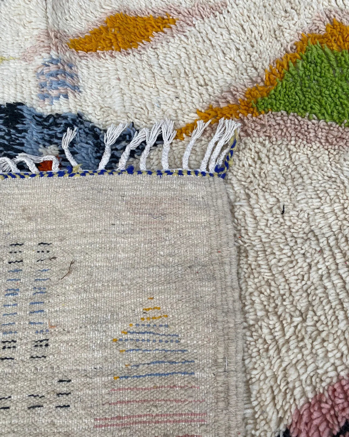 Painted Diamond Azilal Rug, the back of the rug showing the hand-tied knots