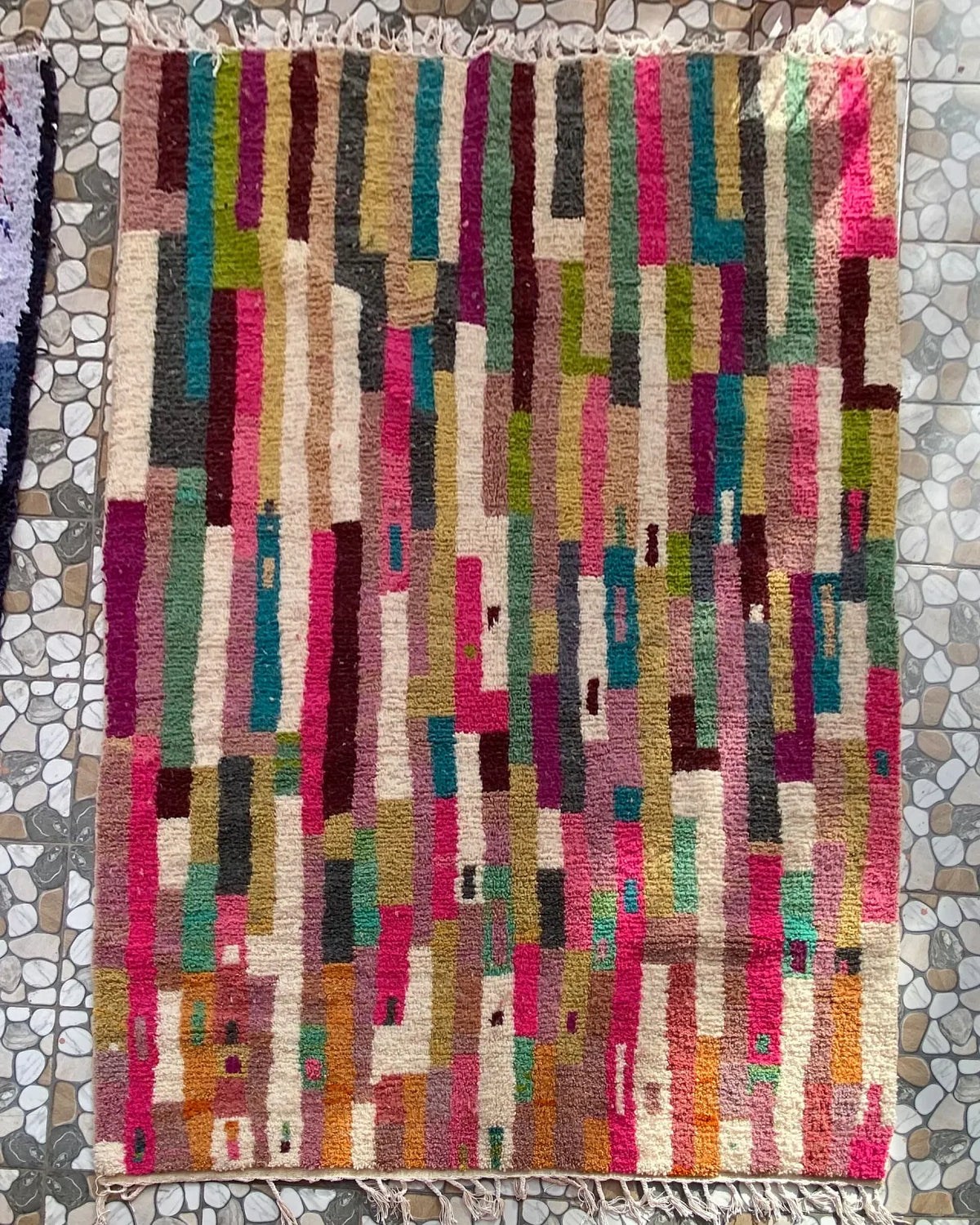 Patchwork Stripe Moroccan Rug, full view laid flat on the workshop floor