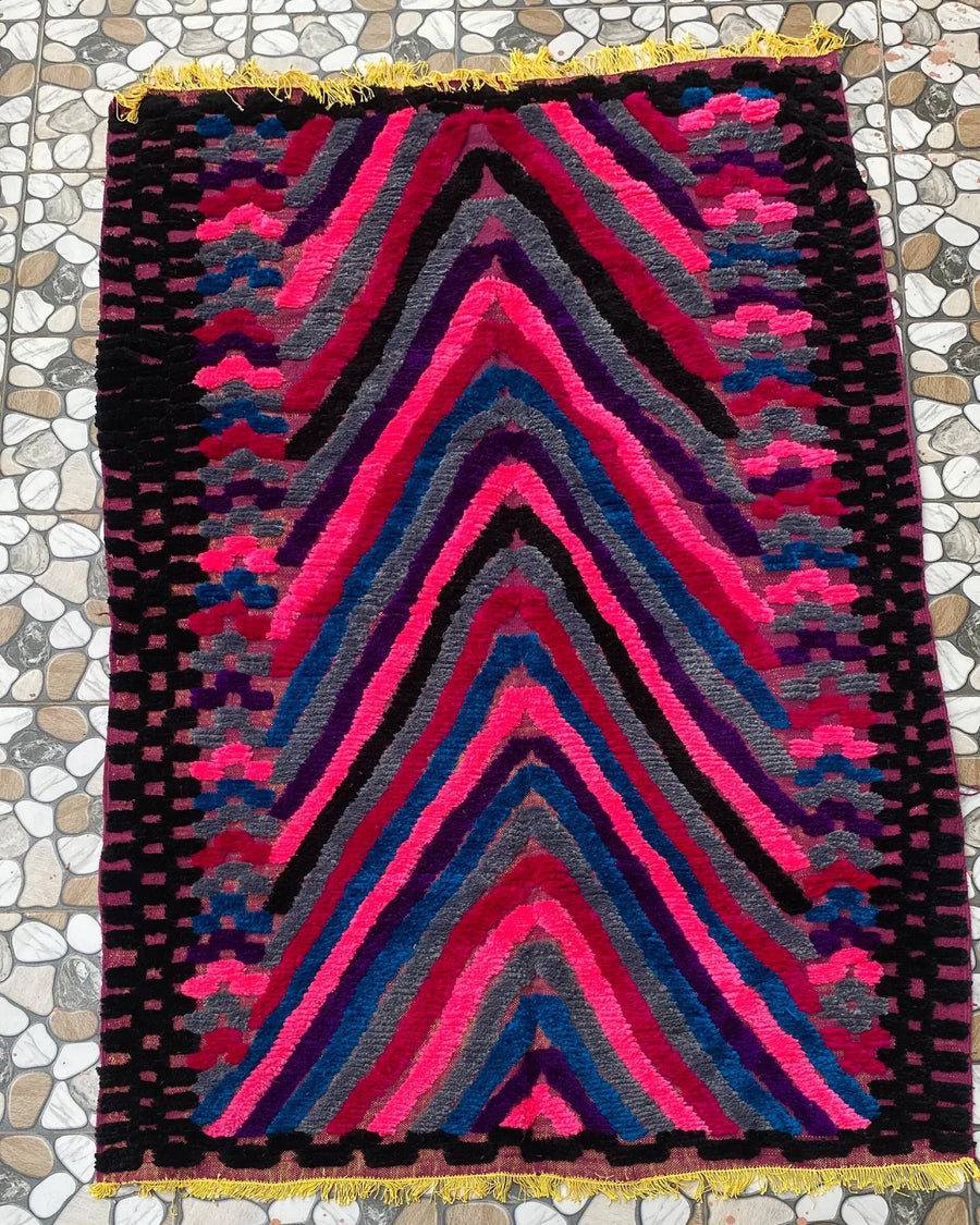 Pink and Blue Chevron Moroccan Rug, full view laid flat on the workshop floor