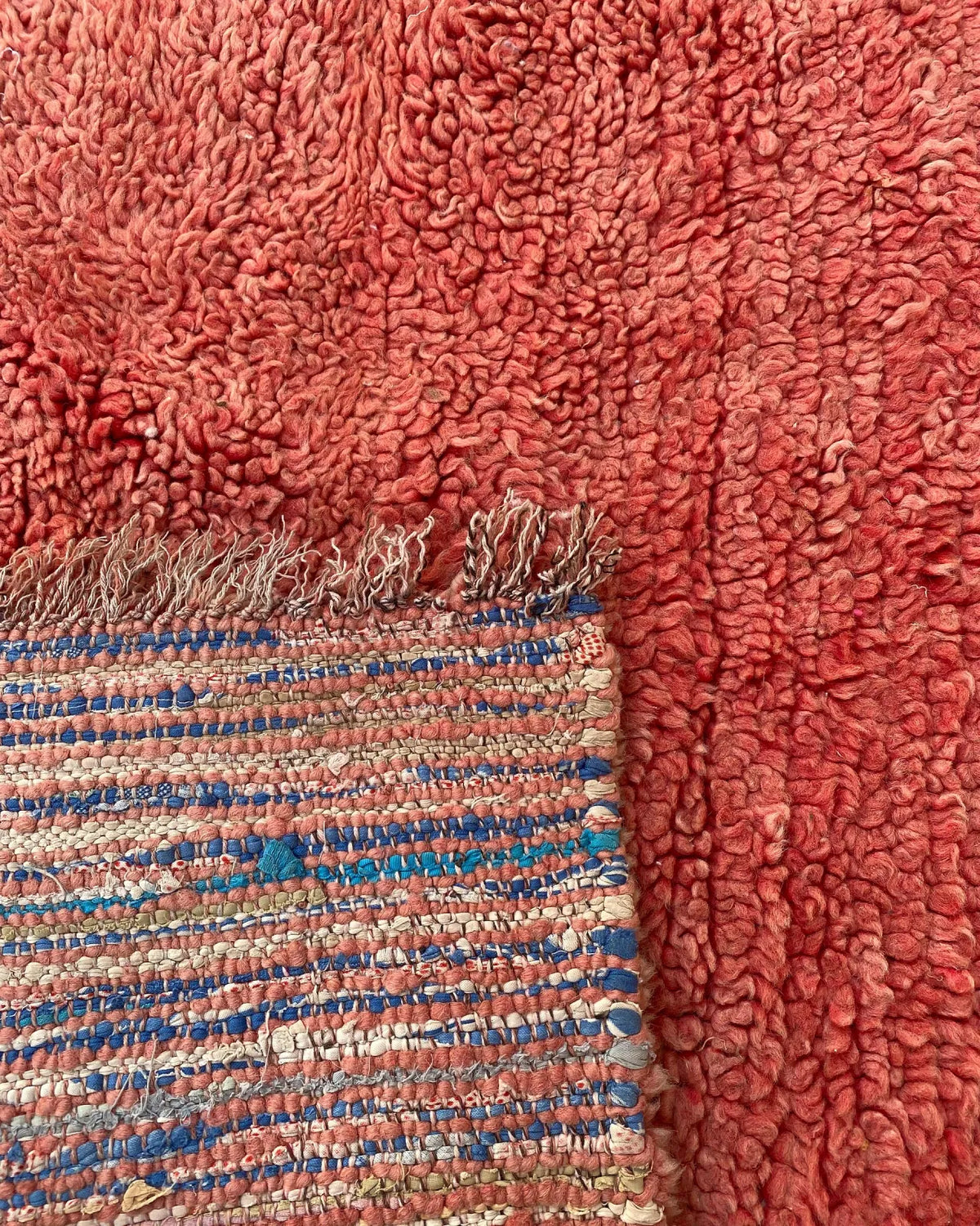 Rust Red Plain Beni Ourain Rug, the back of the rug showing the hand-tied knots